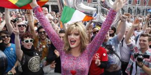 Rory O'Neill, known by the Drag persona Panti, celebrates with yes supporters at Dublin Castle, Ireland, Saturday, May 23, 2015. Ireland has voted resoundingly to legalize gay marriage in the world's first national vote on the issue, leaders on both sides of the Irish referendum declared Saturday even as official ballot counting continued. Senior figures from the "no" campaign, who sought to prevent Ireland's constitution from being amended to permit same-sex marriages, say the only question is how large the "yes" side's margin of victory will be from Friday's vote. (ANSA/AP Photo/Peter Morrison)